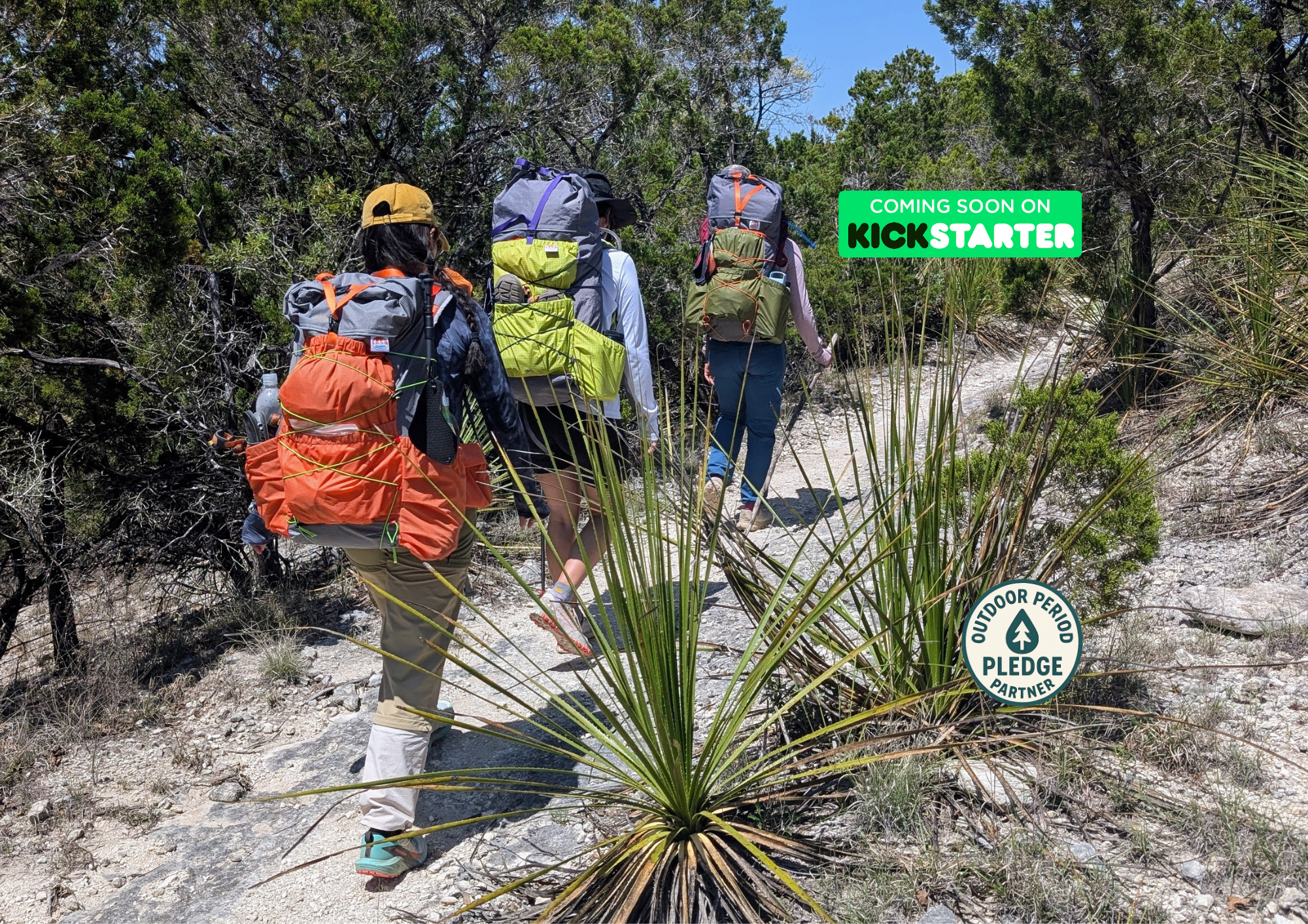 Three women hiking up a Texas desert hilltop wearing Sojourn Trekkr backpacks